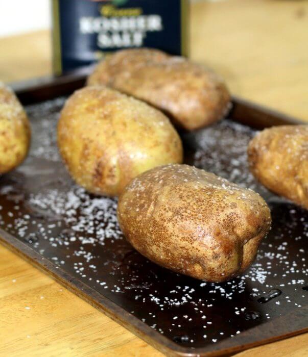 Twice Baked Potatoes poke holes in the potatoes and rub the outside with coarse salt
