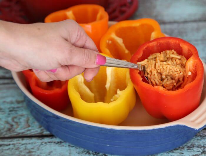 Bell peppers with Spanish rice for healthy stuffed peppers recipe.