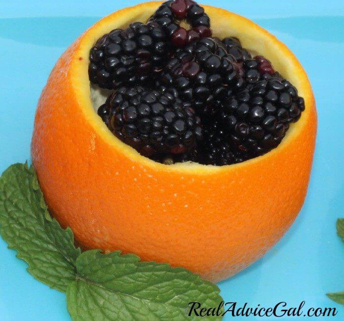 How to hollow out oranges to use as fruit bowls one bowl filled with blackberries
