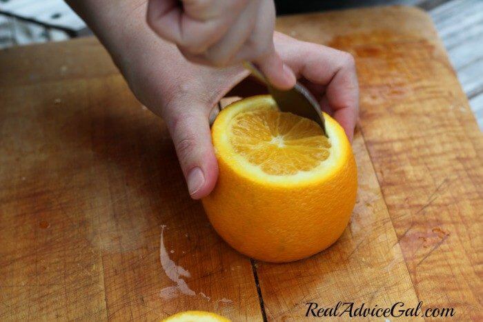 How to hollow out oranges to use as fruit bowls then use a spoon to separate flesh from peel