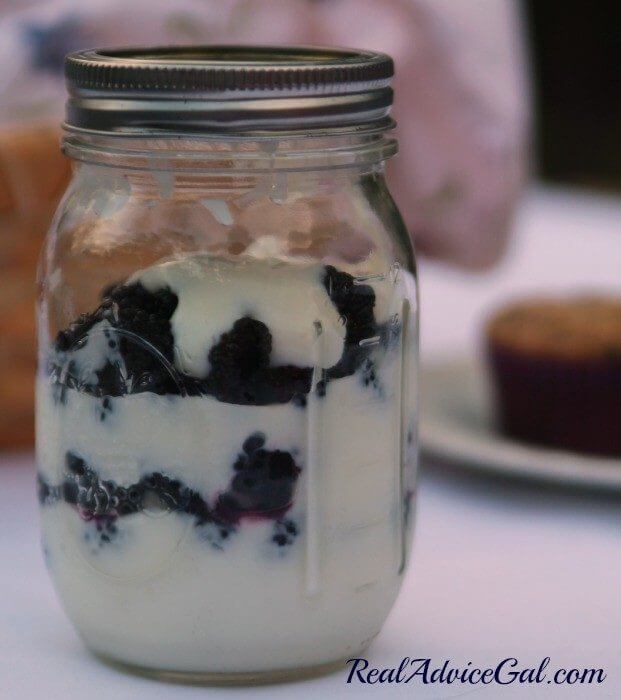 Easy mulberry yogurt parfait. Layer vanilla yogurt and mulberries and granola.