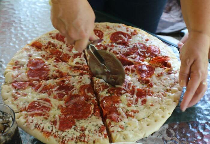 effortless meals slice the pizza with a pizza wheel