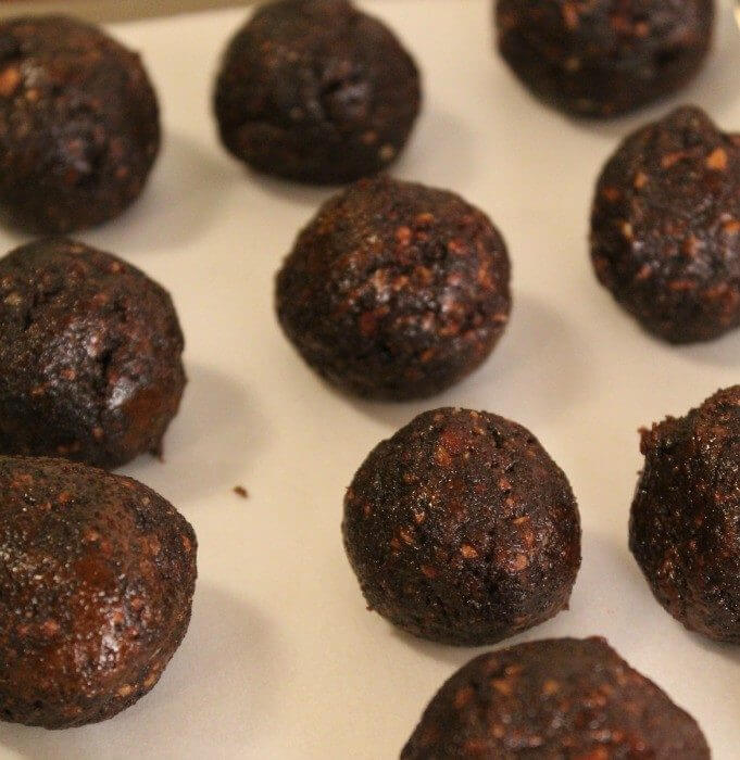 Chocolate Butterfinger Cake Pops rolled into balls