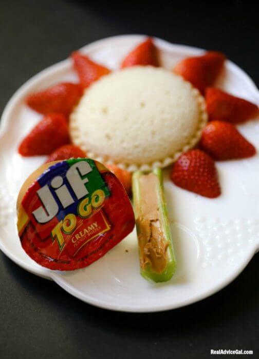 Stay at home vacation snack with Uncrustables® Sandwiches, Jif® to Go® Peanut Butter and Smucker’s® Squeeze™ Fruit Spread 