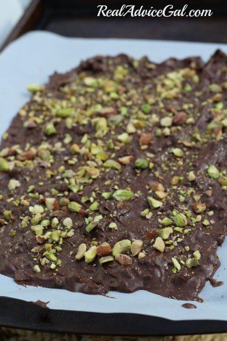 Salted Almond and Pistachio Bark Spread on a cookie sheet