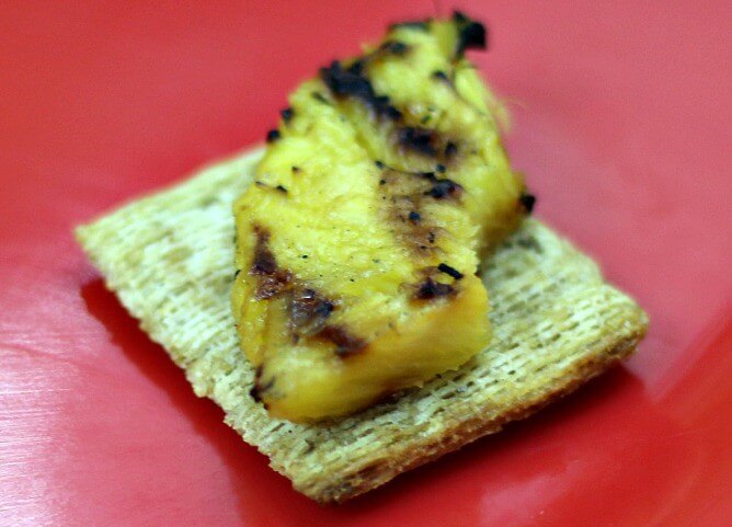 Add a chunk of pineapple to the cracker