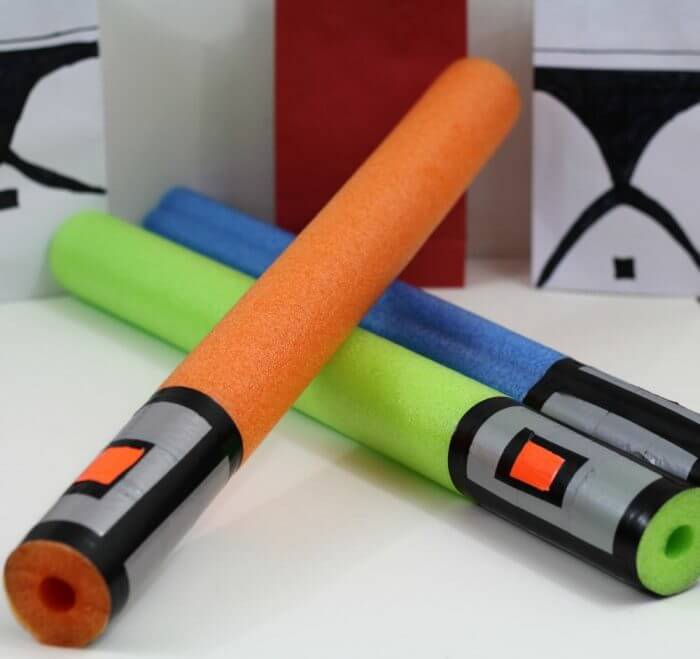 Light sabers made out of pool noodles are the perfect party favor for any Star Wars themed party. Add them to your list of Star Wars Birthday Parties Ideas