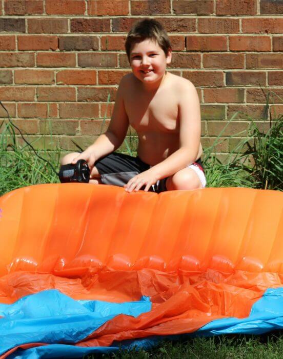 Use an air pump to pump up the inflatable launch pad