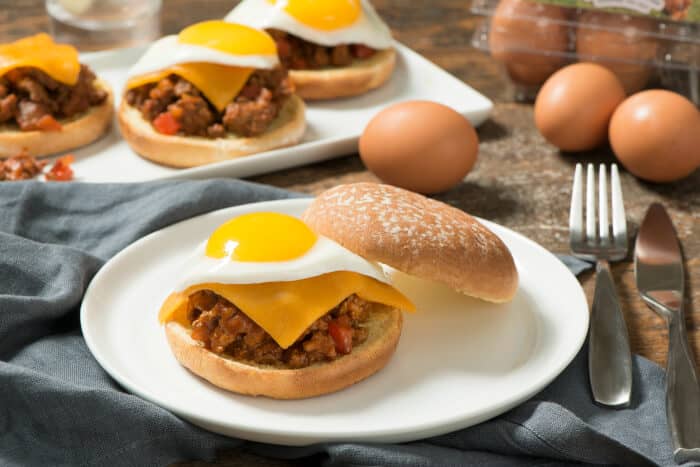 This Smoky Sloppy Joes with Fried Eggs is a hearty sandwich seasoned with smoked paprika, then topped with cheese and a fried egg.